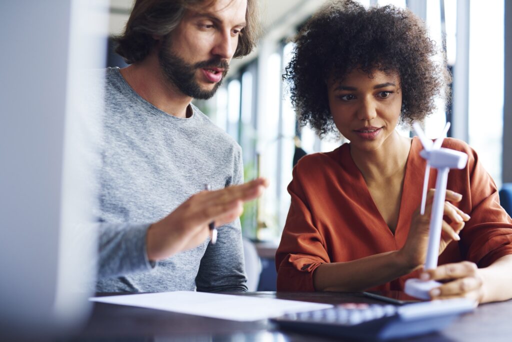 Business couple talking in office meeting