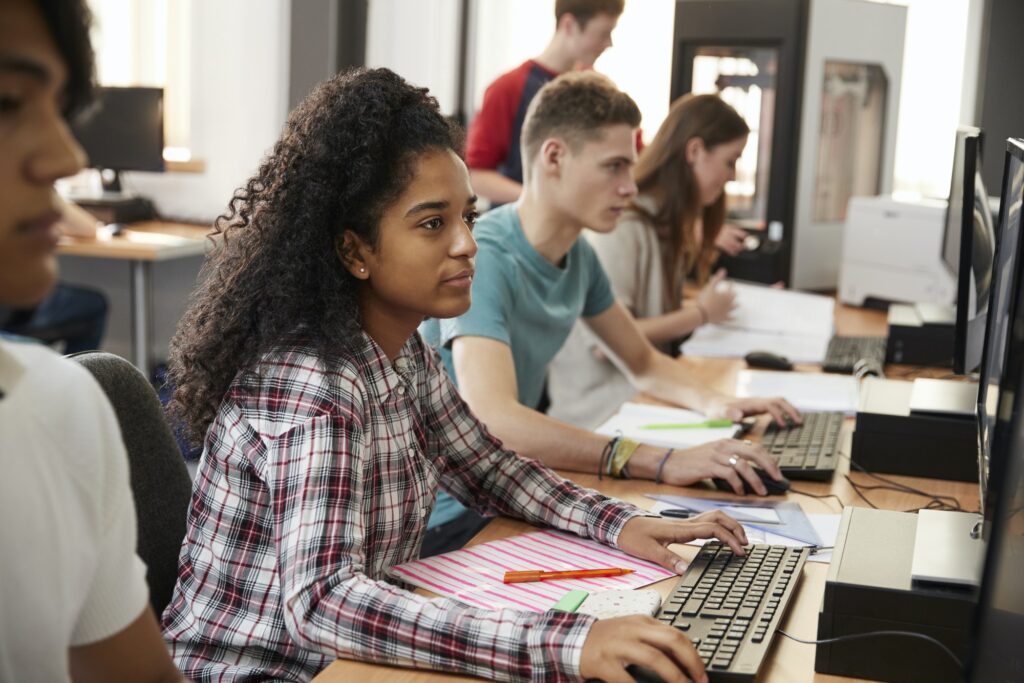 Design Students Working On Computers In CAD/3D Printing Lab