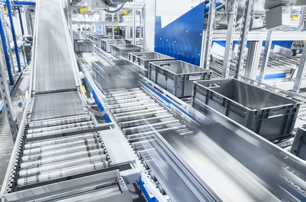 Modern conveyor system with boxes in motion.