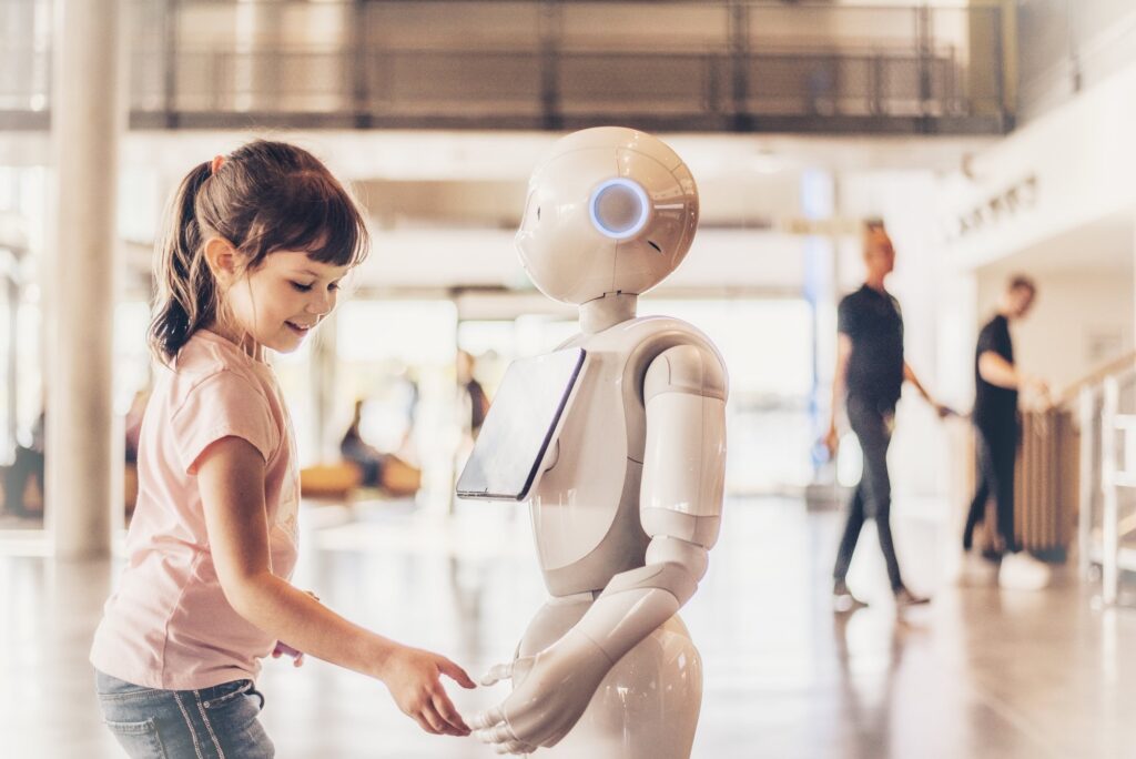 A girl interacting with a robot