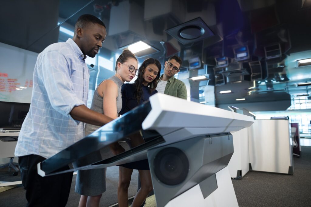 Business executives touching digital screen