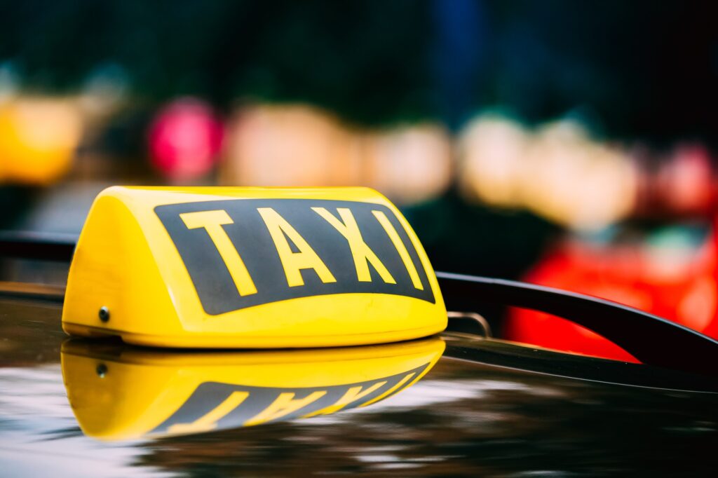 Taxi Sign On Roof Of Car